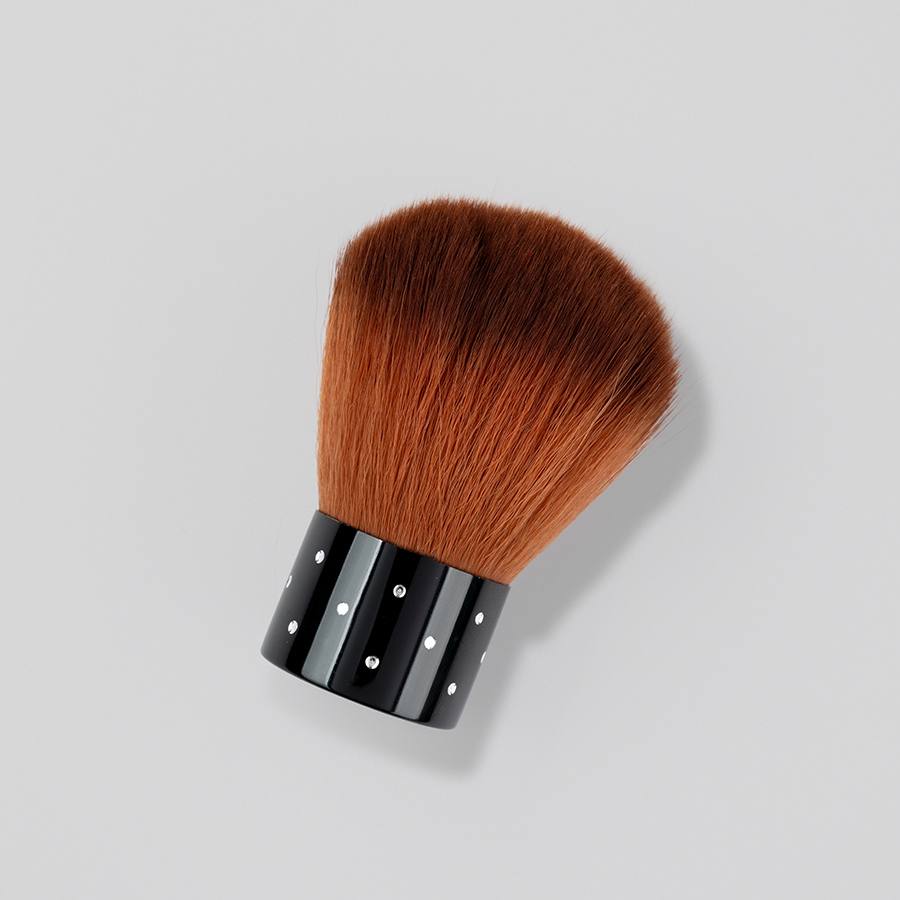 Brocha Polvo Manicura con cerdas sintéticas suaves y mango ergonómico.