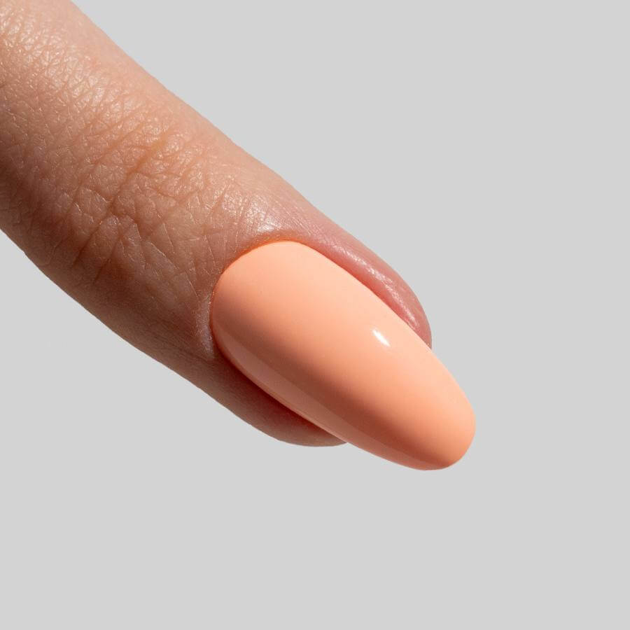 Esmalte Semipermanente Naranja Rosado, cobertura total y fácil aplicación con acabados brillantes o mate.